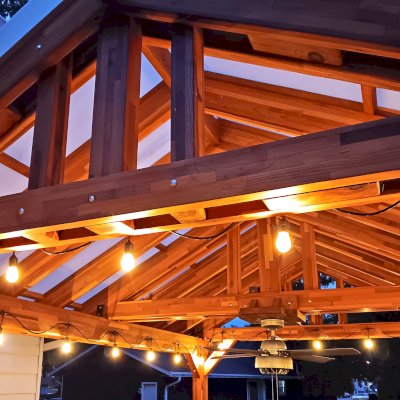 Illuminati Pavilion (Options: 15' L, 12' W, Mosaic Redwood, Unattached, Electrical Wiring Trim for 1 Post, 4-Post Anchor Kit for High-Wind, 1 Ceiling Fan Base, No Privacy Panels, No Curtain Rods, 9.5' Post Height, with Fascia Boards, Transparent Premium Sealant). Photo Courtesy of R. Pittenger of Troy, OH.