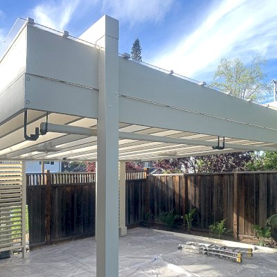 L.A. Modern Pergola (Options: 18' L, 16' W, California Redwood, 10 ft Post Height, 1 Electrical Wiring Trim Kit, 4-Post Anchor Kit for High-Wind, 2 Ceiling Fan Bases,  with Transparent Rain Guard, Custom Paint Finish).