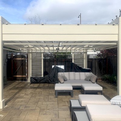 L.A. Modern Pergola (Options: 18' L, 16' W, California Redwood, 10 ft Post Height, 1 Electrical Wiring Trim Kit, 4-Post Anchor Kit for High-Wind, 2 Ceiling Fan Bases,  with Transparent Rain Guard, Custom Paint Finish).