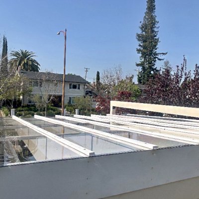 L.A. Modern Pergola (Options: 18' L, 16' W, California Redwood, 10 ft Post Height, 1 Electrical Wiring Trim Kit, 4-Post Anchor Kit for High-Wind, 2 Ceiling Fan Bases,  with Transparent Rain Guard, Custom Paint Finish).