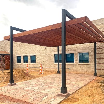 Custom L.A. Modern Pergola (Options: 20' L, 20' W, Mature Redwood, 12 ft Post Height, No Privacy Panels, No Electrical Wiring Trim Kit, 4-Post Anchor Kit for Concrete, No Ceiling Fan Base,  No Rain Guard, Black Stain Premium Sealant & Cherry Stain).