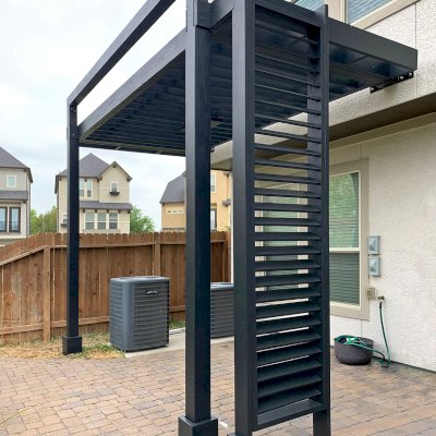 Custom Attached L.A. Modern Pergola (Options: 14' L, 7' W, Douglas-fir, No Rain Guard, 11.5 ft Post Height, 2 Electrical Wiring Trims, 2-Post Anchor Kit for Concrete, 1 Ceiling Fan Base, Black Stain Premium Sealant). Photo Courtesy of N. Nichols of Houston, Texas.