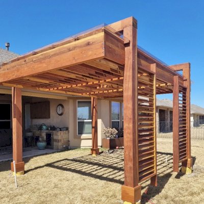 L.A. Modern Pergola (Options: 16' L, 12' W, California Redwood, with Rain Guard, 10 ft Post Height, 2 Electrical Wiring Trims, 4-Post Anchor Kit for Concrete, 1 Ceiling Fan Base, No Retractable Shade Canopy, Transparent Premium Sealant). Photo Courtesy of T. Huber of Round Rock, TX.