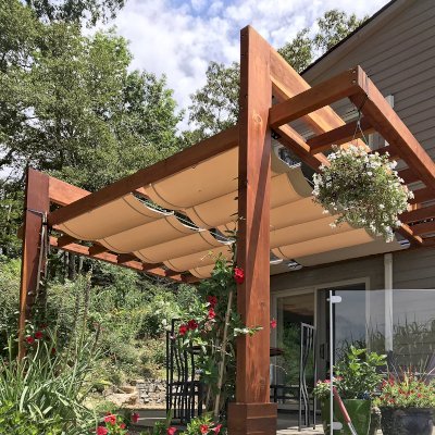 Custom L.A. Modern Pergola (Options: 16' L, 13' W, California Redwood, No Rain Guard, 12" x 4" Posts & Supports,  10 ft Post Height, No Electrical Wiring Trim, 4-Post Anchor Kit for High-Wind, No Ceiling Fan Base, Retractable Shade Canopy will be Installed, Transparent Premium Sealant). Photo Courtesy of W. Craig of Fairview, North Carolina.