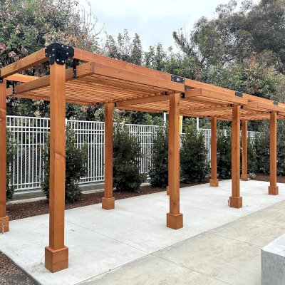 Custom L.A. Modern Pergola (Options: 32' L x 9' W, Douglas-fir, without Rain Guard, 10 ft Post Height, No Electrical Wiring Trim, Post Anchor Kit for Concrete, No Ceiling Fan Base, No Retractable Shade Canopy, Transparent Premium Sealant). Photo Courtesy of J. Kim of Whittier, CA.