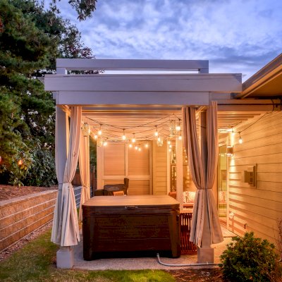Custom L.A. Modern Pergola (Options: 17' L, 12' W, Douglas-fir, 10.5 ft Post Height, No Electrical Wiring Trim Kit, 4-Post Anchor Kit for Concrete, No Ceiling Fan Base,  with Transparent Rain Guard, Custom Paint Finish) with 1 Standalone Privacy Panel (Louvered). Photo Courtesy of J. Williamson of Bow, Washington.