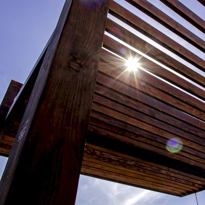 L.A. Modern Pergola (Options: 16' L, 14' W, Douglas-fir, No Rain Guard, 10 ft Post Height, No Electrical Wiring Trim, 4-Post Anchor Kit for High-Wind, No Ceiling Fan Base, No Retractable Shade Canopy, Cherry Stain Premium Sealant).