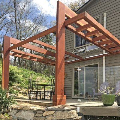 Custom L.A. Modern Pergola (Options: 16' L, 13' W, California Redwood, No Rain Guard, 12" x 4" Posts & Supports,  10 ft Post Height, No Electrical Wiring Trim, 4-Post Anchor Kit for High-Wind, No Ceiling Fan Base, Retractable Shade Canopy will be Installed, Transparent Premium Sealant). Photo Courtesy of W. Craig of Fairview, North Carolina.