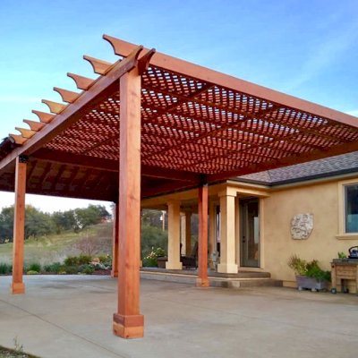 Lattice Pergola Kit & Loreto Pavilion (Options: 16' L x 20' W, Attached to a 20' x 20' Loreto Pavilion, California Redwood, No Electrical Wiring Trim, Widthwise Roof Support Timbers, 6-Post Anchor Kit for High-Wind, No Ceiling Fan Base, No Privacy Panels, No Curtain Rods, 9.5' Post Height, Transparent Premium Sealant). Photo Courtesy of R. Offenbach of Ione, CA.