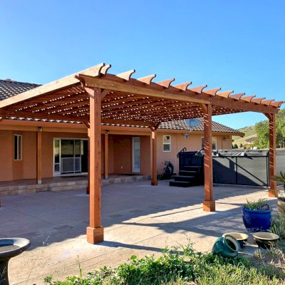 Lattice Pergola Kit (Options: 24' L x 20' W, California Redwood, No Electrical Wiring Trim, Lengthwise Roof Support Timbers, 6-Post Anchor Kit for Concrete, No ceiling Fan Base, No Privacy Panels, No Curtains Rods, 9.5' Post Height, Transparent Premium Sealant). Photo Courtesy of C. Lopez of Salinas, CA.