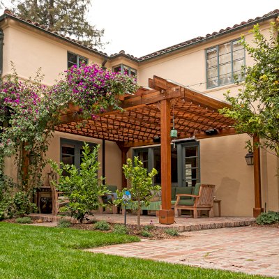 Custom Lattice Pergola Kit (Options: 19' L x 16' W, California Redwood, Electrical Wiring Trim for 2 Posts, 4-Post Kit for Concrete, No Ceiling Fan Base, No Privacy Panels, No Curtain Rods, 9' Post Height, Transparent Premium Sealant). Lattice panels were customized with larger openings than is the standard design. Photo Courtesy of D. Wood of Palo Alto, California.