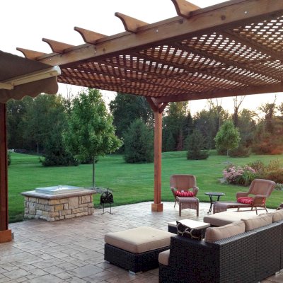 Lattice Pergola Kit (Options: 20' L x 16' W, Mature Redwood, No Electrical Wiring Trim, Lengthwise Roof Support Timbers, 4-Post Kit for Stone, Brick, or Concrete, No Ceiling Fan Base, No Privacy Panels, No Curtain Rods, 10' Post Height, Transparent Premium Sealant). Photo Courtesy of David Wilson.