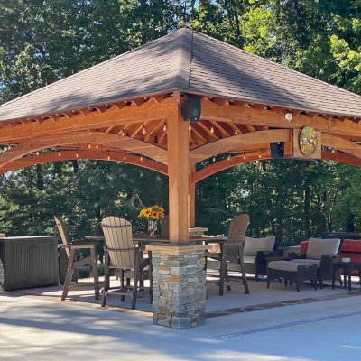 Loreto Pavilion (Options: 20' L x 20' W, 8x8 Posts, No Privacy Panels, Douglas-fir, 9.5' H, Electrical Wiring for 1 Post, 4-Post Anchor Kit for High Wind, No Post Decorative Trim, 1 Ceiling Fan Base, No Curtain Rods, Transparent Premium Sealant). Photo Courtesy of Bill & Lori O’Mara of Marion, North Carolina.