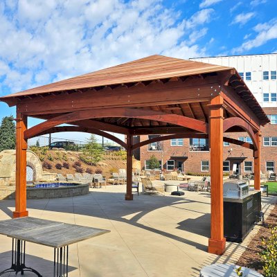 Loreto Pavilion (Options: 20' L x 20' W, 8x8 Posts, No Privacy Panels, Mature Redwood, 10' H, Electrical Wiring Trim for 4 Posts, Post Anchor Kit for High-Wind, Horizontal Post Decorative Trims, 4 Ceiling Fan Bases, No Curtain Rods, Transparent Premium Sealant). Photo Courtesy of D. Loeffel of Atlanta, GA.