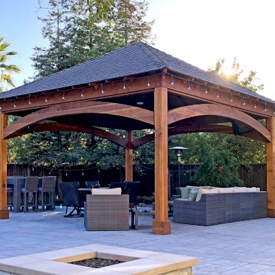 Loreto Pavilion (Options: 20' L x 20' W, 8x8 Posts, No Privacy Panels, California Redwood, 10' H Posts, Electrical Wiring for 2 Posts, 4-Post Anchor Kit for High-Wind, No Post Decorative Trim, 1 Ceiling Fan Base, No Curtain Rods, Transparent Premium Sealant). Photo Courtesy of G. Arruda of Livermore, California.