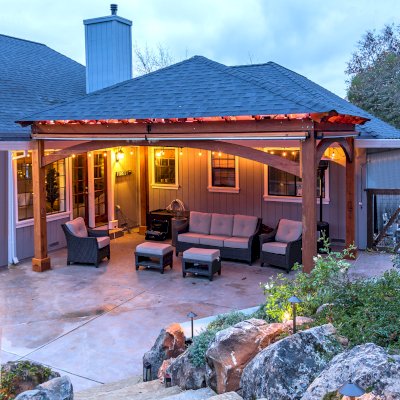 Loreto Pavilion (Options: 24' L x 18' W, 8x8 Posts, No Privacy Panels, California Redwood, 10' H, Electrical Wiring for 1 Post, 4-Post Anchor Kit for Concrete, No Post Decorative Trim, 1 Ceiling Fan Base, 2 Curtain Rods, Transparent Premium Sealant). Photo Courtesy of J. McLauglin of Santa Rosa, California.