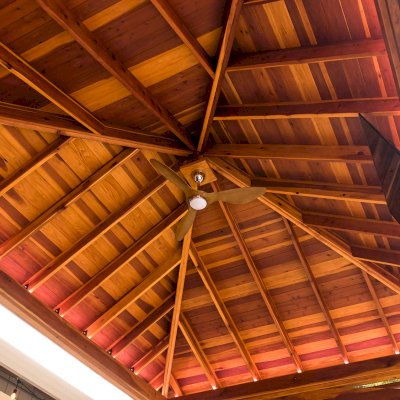 Loreto Pavilion (Options: 24' L x 18' W, 8x8 Posts, No Privacy Panels, California Redwood, 10' H, Electrical Wiring for 1 Post, 4-Post Anchor Kit for Concrete, No Post Decorative Trim, 1 Ceiling Fan Base, 2 Curtain Rods, Transparent Premium Sealant). Photo Courtesy of J. McLauglin of Santa Rosa, California.