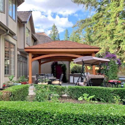 Loreto Pavilion (Options: 20' L x 14' W, 8x8 Posts, No Privacy Panels, Douglas-fir, 9.5' H, No Electrical Wiring Trim, 4-Post Anchor Kit for High-Wind, No Post Decorative Trim, No Ceiling Fan Base, No Curtain Rods, Transparent Premium Sealant, with Redwood Shingles by Custom Request). Photo Courtesy of M. Singh of Redmond, Washington.