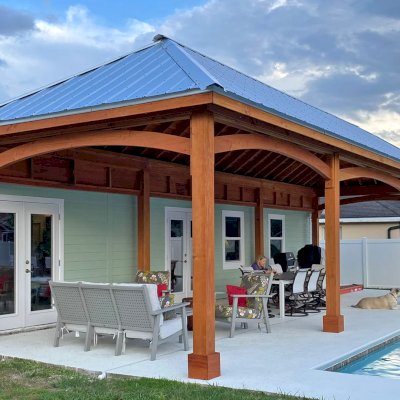 Loreto Pavilion (Options: 44' L x 16' W, 8x8 Posts, No Privacy Panels, Douglas-fir, 10' H, Electrical Wiring for 4 Posts, 8-Post Anchor Kit for High-Wind, No Post Decorative Trim, 3 Ceiling Fan Bases, with Fascia Boards for Gutters, Transparent Premium Sealant). Photo Courtesy of T. Lentz of Port St. Lucie, FL.