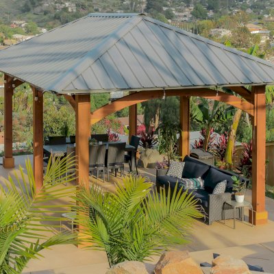 Loreto Pavilion (Options: 26' L x 14' W, 8x8 Posts, No Privacy Panels, California Redwood, 9.5' H, Electrical Wiring for 3 Posts, 6-Post Anchor Kit for High-Wind, No Post Decorative Trim, 2 Ceiling Fan Bases, Transparent Premium Sealant). Photo Courtesy of M. Holmes of Lakeside, CA.