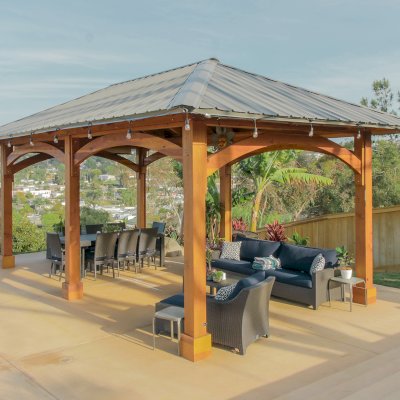 Loreto Pavilion (Options: 26' L x 14' W, 8x8 Posts, No Privacy Panels, California Redwood, 9.5' H, Electrical Wiring for 3 Posts, 6-Post Anchor Kit for High-Wind, No Post Decorative Trim, 2 Ceiling Fan Bases, Transparent Premium Sealant). Photo Courtesy of M. Holmes of Lakeside, CA.