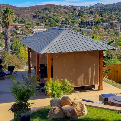 Loreto Pavilion (Options: 26' L x 14' W, 8x8 Posts, No Privacy Panels, California Redwood, 9.5' H, Electrical Wiring for 3 Posts, 6-Post Anchor Kit for High-Wind, No Post Decorative Trim, 2 Ceiling Fan Bases, Transparent Premium Sealant). Photo Courtesy of M. Holmes of Lakeside, CA.