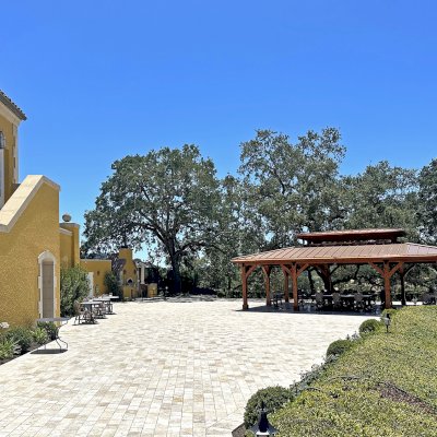Custom Mia's Pavilion (Options: 35' x 25', Douglas-fir, Post Anchor Kit for High-Wind, 8x8 Posts, 8' H Posts, No Decorative Trims for Posts, with Ceiling Fan Bases, Custom Copper Roof and Gutters, Custom Finish). Photo Courtesy of Jordan Vineyard & Winery, 1474 Alexander Valley Rd, Healdsburg, CA.