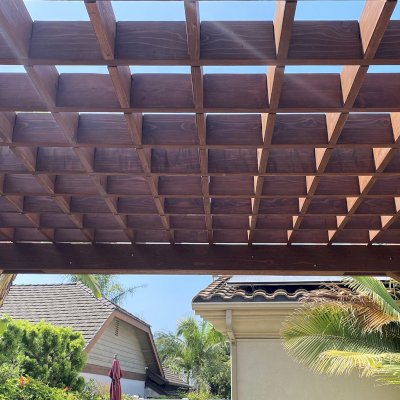 Custom Montvale Pergola (Options: Irregular Shape That is 14' x 16' on 2 Adjacent Sides, But the Side Opposite the 16' was Extended to 22' and Have a 5th Post, California Redwood, 9.5' Posts, Coffee-Stain Premium Sealant). Photo Courtesy of G. Tanaka of Torrance, CA.
