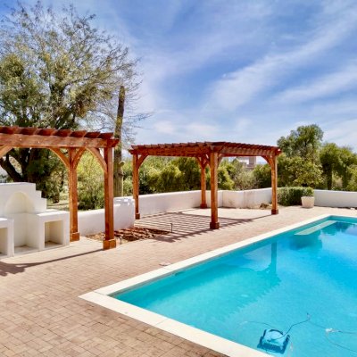 Montvale Pergolas (Options: 14' x 8' & 20' x 16' & 4' x 6', Douglas-fir, Electrical Wiring Trim for 1 Post, Rafters at 16", 4-Post Anchor Kit for High-Wind, No Ceiling Fan Base, No Privacy Panels, 10' Post, Transparent Premium Sealant). Photo courtesy of M. Simpson of Tucson, Arizona.
