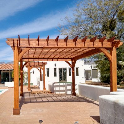 Montvale Pergolas (Options: 14' x 8' & 20' x 16', Douglas-fir, Electrical Wiring Trim for 1 Post, Rafters at 16", 4-Post Anchor Kit for High-Wind, No Ceiling Fan Base, No Privacy Panels, 10' Post, Transparent Premium Sealant). Photo courtesy of M. Simpson of Tucson, Arizona.
