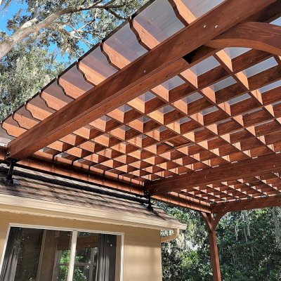 Custom Attached Montvale Pergola (Options: 26' x 18', California Redwood, 12' Posts, with Rain Guard, Coffee-Stain Premium Sealant). Photo Courtesy of D. Fournier of Valrico, FL.