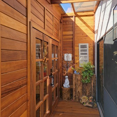 Palo Alto Backyard Cabin (Options: 18' L, 16' W, Without Porch, Structural Deck - Interior and 4' Exterior, California Redwood, Sugar Pine Internal Walls and Ceiling, Windows Purchased Locally, With Two 3' x 5' Skylights, Metal Roof, Custom Railings and Steps, Electrical Wire Trim on the Walls, Transparent Premium Sealant). Photo Courtesy of A. Ramon of South San Francisco, California.