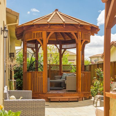 Palomar Round Pavilion (Options: 15' L x 10'-6" W, with Deck, California Redwood, With Upper Corvels and Lower Panels, Transparent Premium Sealant). Photo Courtesy of A. Singh of Dublin, California.