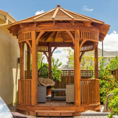Palomar Round Pavilion (Options: 15' L x 10'-6" W, with Deck, California Redwood, With Upper Corvels and Lower Panels, Transparent Premium Sealant). Photo Courtesy of A. Singh of Dublin, California.