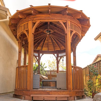 Palomar Round Pavilion (Options: 15' L x 10'-6" W, with Deck, California Redwood, With Upper Corvels and Lower Panels, Transparent Premium Sealant). Photo Courtesy of A. Singh of Dublin, California.
