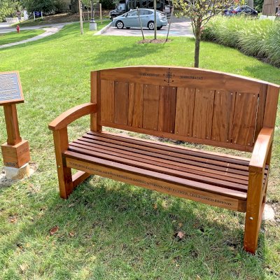 Presidential Bench (Options: 5 ft, No Cushion, Custom Engraving). Bench installed in Adelaide of Newton Centre in 157 Herrick Road, Newton, MA 02459.