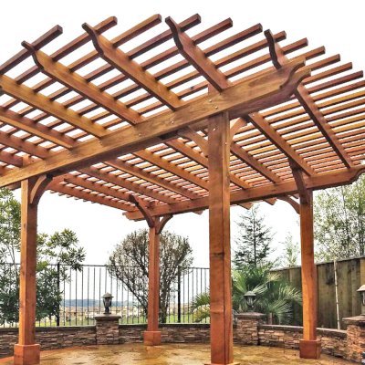 Round Pergola (Options: 16' Diameter, No Privacy Panel, California Redwood, Open Roof Slats at 6", 9.5ft Post Height, Include Electrical Wiring Trim for 2 Posts, 4-Post Anchor Kit for Stone, No Post Decorative Trim, No Ceiling Fan Base, No Curtain Rods, Transparent Premium Sealant). Photo courtesy of Harish B. of Dublin, CA