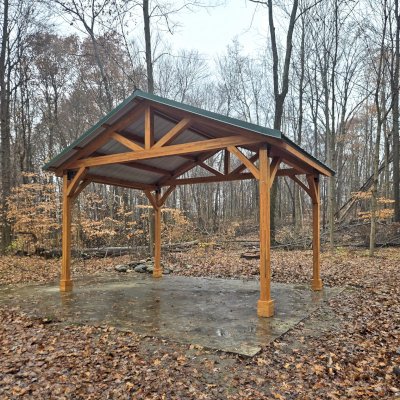 San Carlos Carport Pavilion (Options: 14' L x 20' W, Mosaic Douglas, Post Standard Anchor Kit, 9.5' H Posts, 6x6 Posts, Electrical Wiring Trim Kit for 1 Post, Transparent Premium Sealant). Pavilion installed at Love Creek County Park, 9292 Huckleberry Rd #9736, Berrien Center, MI.