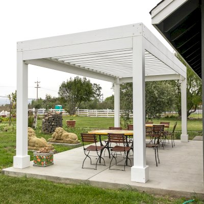 Silverado Modern Pergola (Options: 20' L, 10' W, Standard Roof Style, 12" Roof Rafter Spacing, Mosaic Redwood,  4-Post Anchor kit for Concrete, White Primer). 