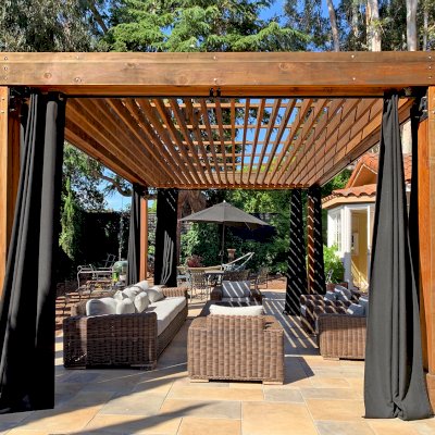 Silverado Modern Pergola (Options: 7 1/4" x 7 1/4" Post Thickness, Standard Roof Style, 20'L x 14'W, No Privacy Panels, California Redwood, No Rain Guard, 9ft Post Height, No Electrical Wiring Trim, 4 Post Anchor Kit for Concrete, 4 Curtain Rods, No Ceiling Fan Base, Transparent Premium Sealant). Photo Courtesy of B. Walsh of Atherton, California.