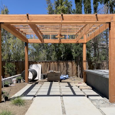 Sun Pergola (Options: 10' L x 10' W, With Rainguard, No Privacy Panel, Douglas Fir, No Curtain Rods, 1 Ceiling Fan Base, 10.5 ft Posts Height, Electrical Wiring Trim Kit for 4 Posts, Post Anchor Kit for High-Wind, Transparent Premium Sealant).