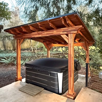 Sunset Patio Pavilion (Options: 11.5' x 11', No Privacy Panel, Mosaic Redwood, 8ft H, Parquet Roof Panels, 1 Electrical Wiring Trim, Post Anchor Kit for Concrete, No Post Decorative Trim, No Ceiling Fan Base, No Curtain Rods, Transparent Premium Sealant). Photo Courtesy of B. Dailey of Seattle, WA.