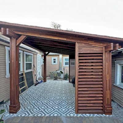Sunset Patio Pavilion (Options: 14' x 12', Wall Privacy Panel Combination and Fixed Louvered Panels, Mosaic Redwood, 8ft H, Electrical Wiring Trim for 1 Post, 4-Post Anchor Kit for Concrete, Vertical Post Decorative Trims, No Ceiling Fan Base, Coffee-Stain Premium Sealant). Photo Courtesy of J. Ringer of Glendale, CA.