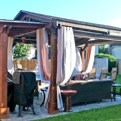 Sunset Patio Pavilion Attached to a Del Norte Pavilion (Options: 10' x 5', Douglas-fir, No Ceiling Fan Base, No Electrical Wiring Trim Kit, 2-Post Anchor Kit for Concrete, Transparent Premium Sealant). Photo Courtesy of Jennifer Grizzle of Katy, Texas.
