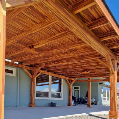 Sunset Patio Pavilion (Options: 28' x 17', Mosaic Redwood, Custom Post Height, 1 Electrical Wiring Trim, 6-Post Anchor Kit for High-Wind, No Post Decorative Trim, 2 Ceiling Fan Bases, No Curtain Rods, Transparent Premium Sealant). Photo Courtesy of M. Neideffer of Star, ID.