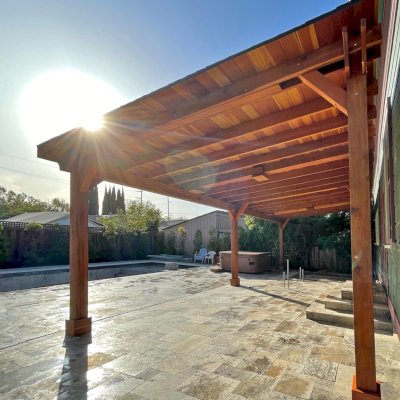 Sunset Patio Pavilion (Options: 35' x 18', California Redwood, 9ft H, 3 Electrical Wiring Trims, 6-Post Anchor Kit for High-Wind, No Post Decorative Trim, 4 Ceiling Fan Bases, No Curtain Rods, Transparent Premium Sealant). Photo Courtesy of L. Shelton of San Jose, California.