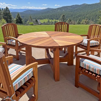 Sunset Patio Tables (Options: 5' Diameter, With Chairs, California Redwood, 4 Luna Armchairs [Customer Purchased 2 Extra Chairs], No Cushions, Standard Tabletop, No Lazy Susan, 2" Umbrella Hole, Transparent Premium Sealant). Photo Courtesy of R. Hudson of Kalispell, MT.
