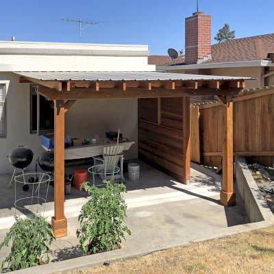 Sunset Porch Pavilion (Options: 14' x 14', California Redwood, Attached to Wall Per Custom Request, 8ft H, No Electrical Wiring Trim, 2-Post Anchor Kit for High-Wind, No Post Decorative Trim, No Ceiling Fan Base, No Curtain Rods, Transparent Premium Sealant). Photo Courtesy of G. Tommasi of San Carlos, California. - Added a Privacy Panel - Solid Wall at Bottom and Mobile Louvers Upper Panel per CUSTOMER REQUEST