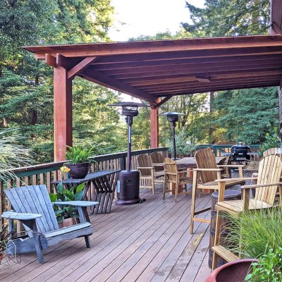 Sunset Porch Pavilion (Options: 18' L x 15' W, California Redwood, Attached to House, 22ft H Posts [From Ground to Tall Deck] by Custom Request, No Electrical Wiring Trim, 2-Post Anchor Kit for Concrete, No Post Decorative Trim, No Ceiling Fan Base, No Curtain Rods, Transparent Premium Sealant). Photo Courtesy of L. Draper of Aptos, California.