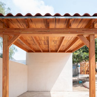 Sunset Porch Pavilion (Options: 20' x 12', Posts and Roof Timbers are Mosaic Douglas-Fir, Parquet Roofing is Mosaic Redwood, 8ft H, No Electrical Wiring Trim, 2-Post Anchor Kit for Concrete, No Post Decorative Trim, No Ceiling Fan Base, No Curtain Rods, Transparent Premium Sealant). Internal Ceiling is Our New Parquet Roofing Finish in California Redwood.